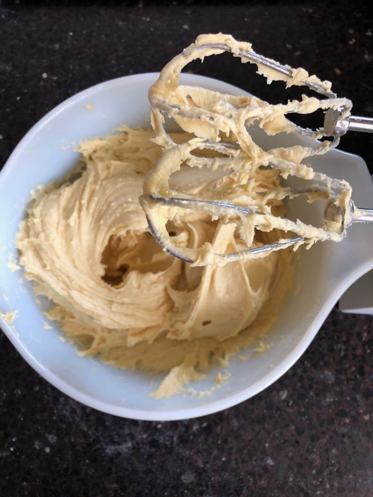Cake mix, eggs, and butter combined with a handheld mixer